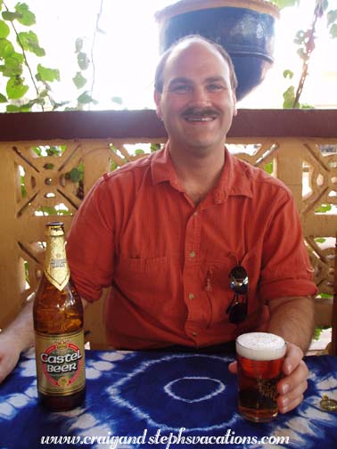 Craig samples local Castel beer Craig samples local Castel beer
