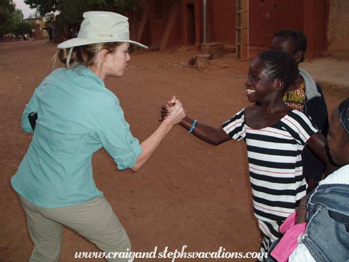 Susan plays with a Segou girl Susan plays with a Segou girl