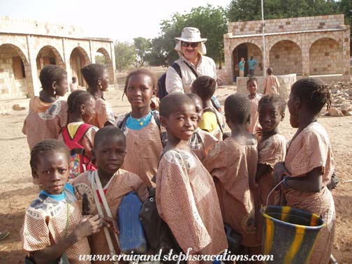 Craig is greeted by Kori-Maounde schoolchildren Craig is greeted by Kori-Maounde schoolchildren