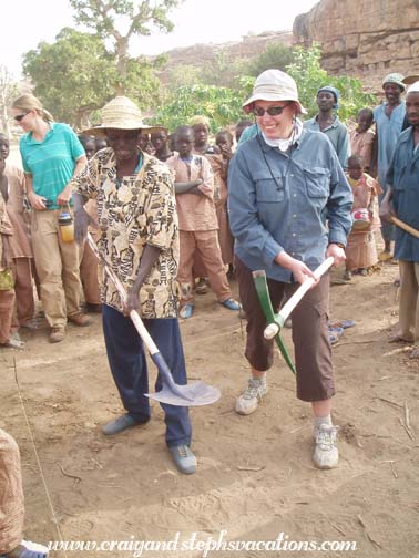 Chief Amadou Napo and Steph break ground for the water basin