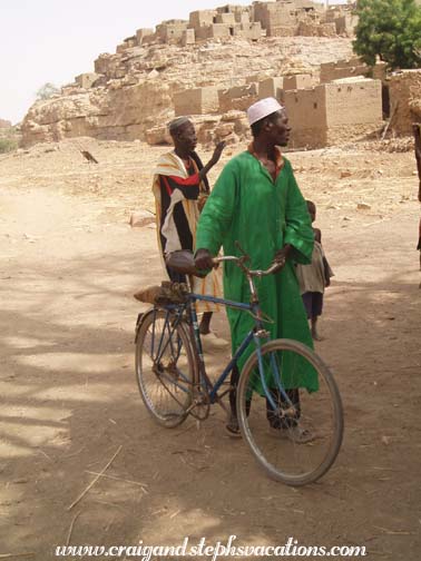 Kori-Maounde resident with his bicycle Kori-Maounde resident with his bicycle