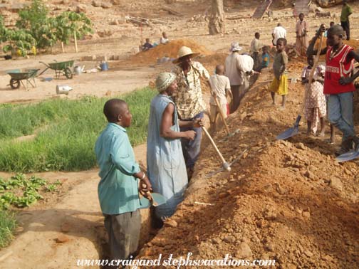 The men dig the trench