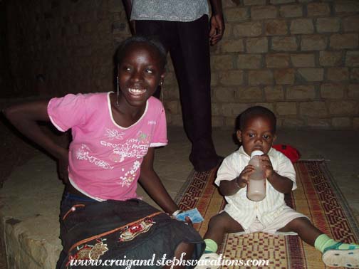 Postcard seller and baby Postcard seller and baby
