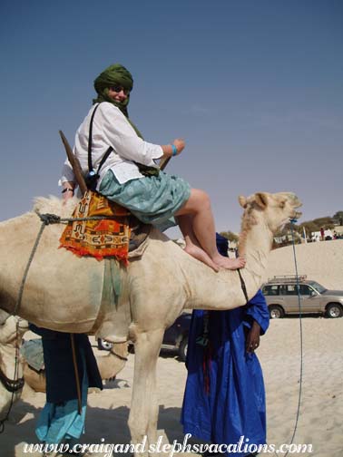 Steph riding a camel