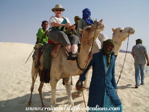 Tina and Craig riding camels