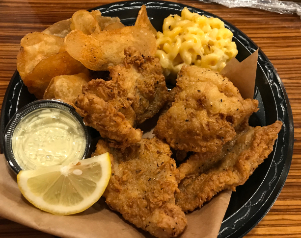 I had fried catfish, hush puppies, house-made potato chips, and mac and cheese, with iced tea to drink at Moe's Original Bar-B-Que. Yum!