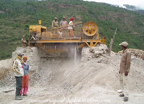 Indian crew running a rock crusher Indian crew running a rock crusher