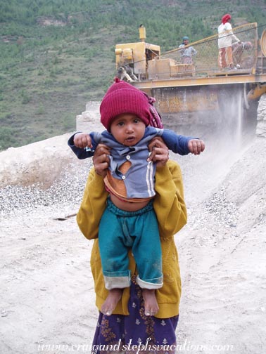 Indian toddler at the rock crusher site Indian toddler at the rock crusher site