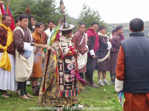 Lama performing a ritual Lama performing a ritual