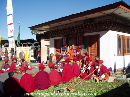 Monks surround the lama Monks surround the lama