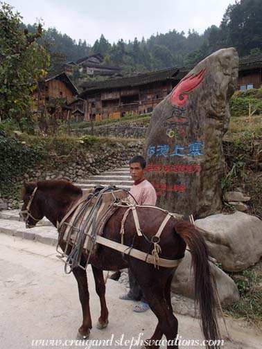 Lang De Village - stone comemorates that the Olympic Torch came here in 2008