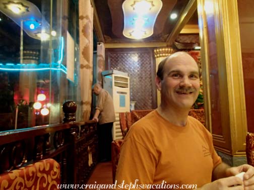 Dinner with the proprietor in the background Dinner with the proprietor in the background