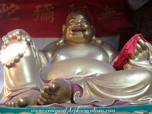 Laughing Buddha, Qinglong (Black Dragon) Cave