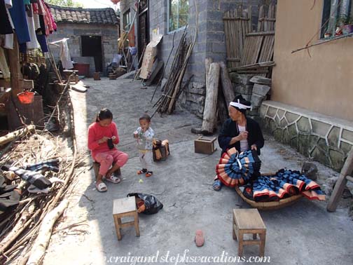 Yao villagers making skirts