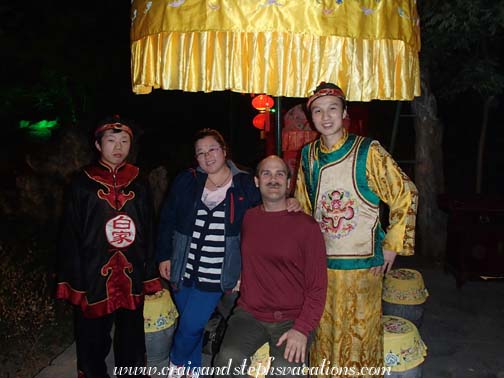 Alice and Craig pose with staff at the Bai Family Restaurant