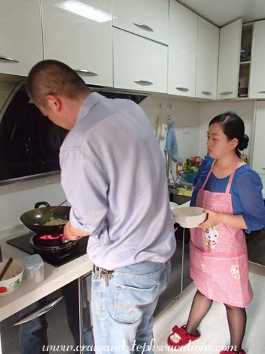 Wang Jun and Xiao Yi hard at work cooking an elaborate dinner