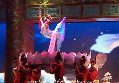 Dancer is brought onstage on a giant lotus, and gracefully dances with a saber for the emperor, Tang Dynasty Show