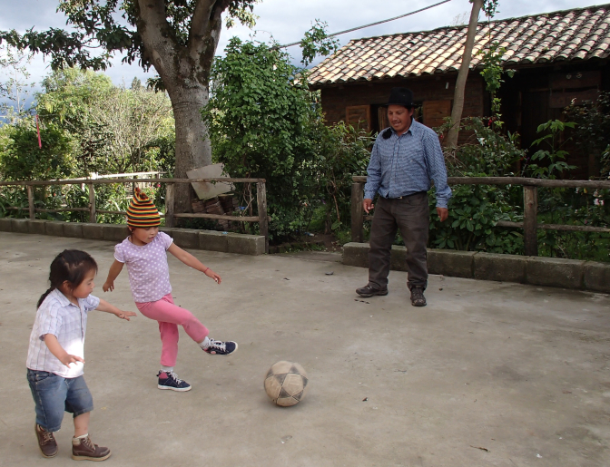 Antonio plays soccer with the kids