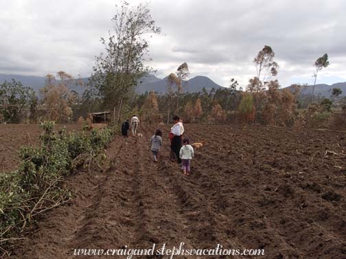 Abuelita, Aida, Yupanqui, Rosa, and Tayanta planting corn and beans
