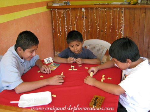 Boys playing dominoes Boys playing dominoes
