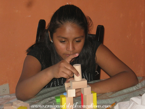 Paola builds with blocks