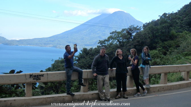 Rodolfo and the Tolers photograph the roadside waterfall