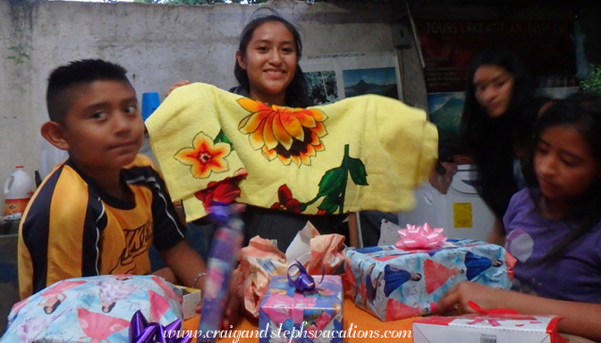 Yoselin opening her birthday gifts