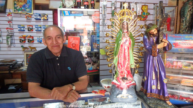 Pedro, our new friend at the photography / religious shrine shop