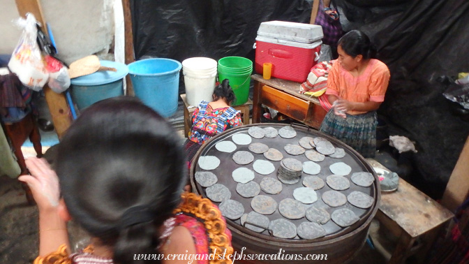 Women making fresh blue corn tortillas