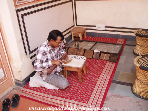 Artisan carving a stamp, Anokhi Museum of Hand Printing