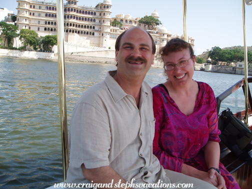 The boat leaving the Lake Palace Hotel