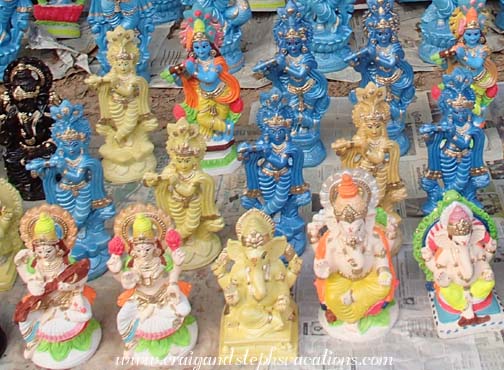 Devotional statues for sale on the walk to the temple