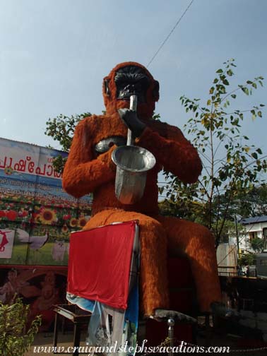 A saxophone-playing monkey welcomes us to Sreekrishna Temple Festival in Guruvayur