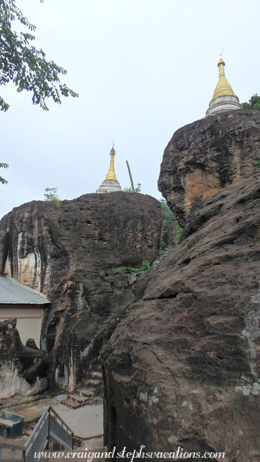 Inverted alms bowl stupas rest directly on top of sandstone hills, Phowin Taung Hill