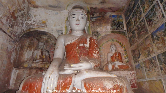 Buddhas and vivid 18th century frescoes in a cave at Phowin Taung