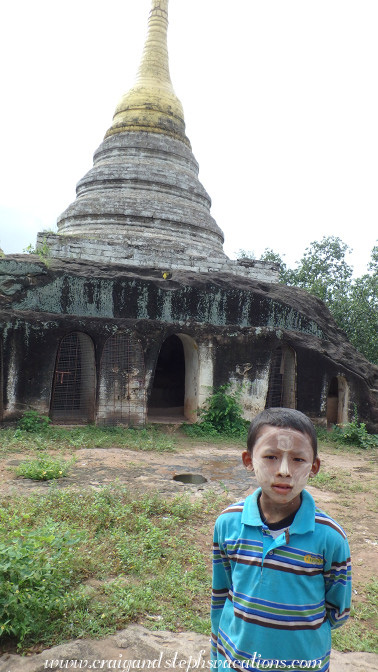 Local boy in front of a cave at Phowin Taung