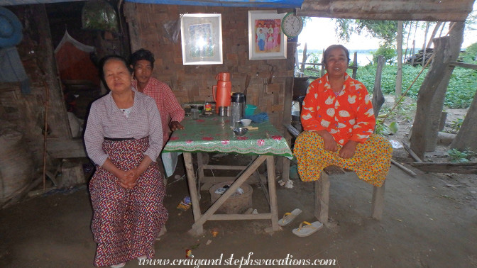 Woman (right) who called us into her yard to take her photograph, Chai Village