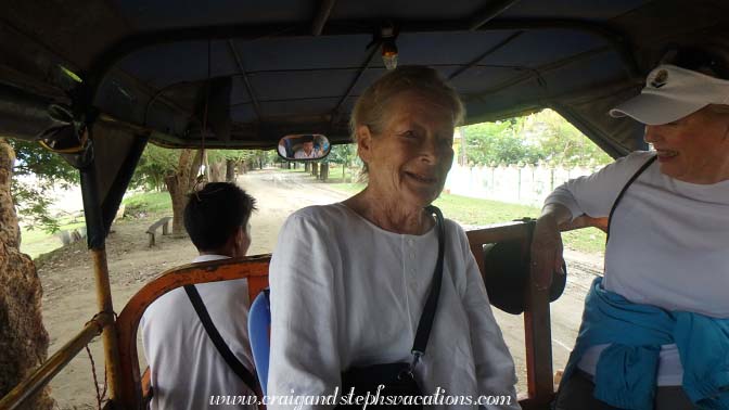 Eda is a good sport and tries riding the  tuk-tuk despite her bad back