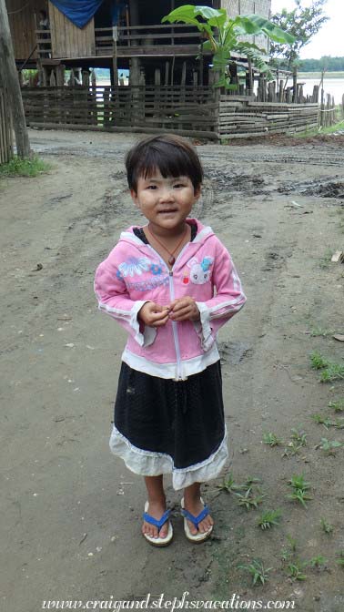Little girl outside the bakery, Kyi Taung Village