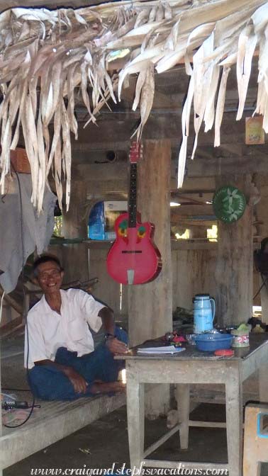 Man and guitar, Kaung Tee Village