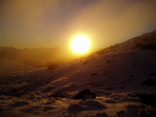 Sunset over the snow campsite