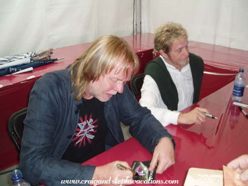 Rick and Jon signing autographs after Return to the Centre of the Earth in Quebec