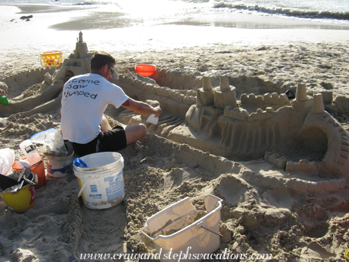 Marty works on the sand castle