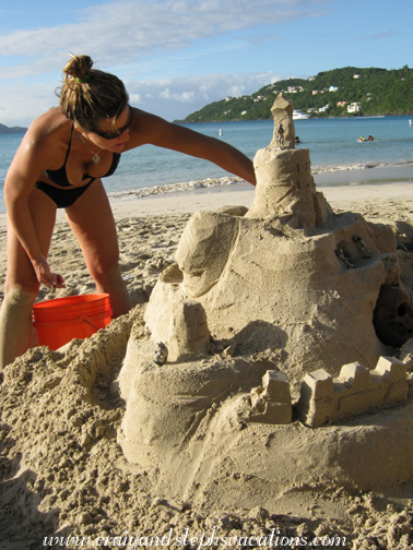 Carol works on the sand castle