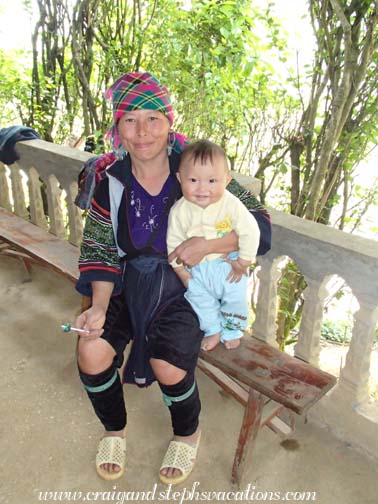 Black Hmong mother and her happy baby boy