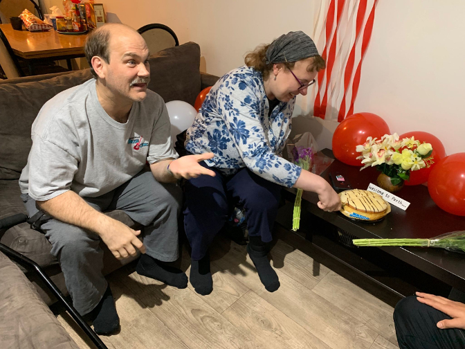 Cutting the welcome cake