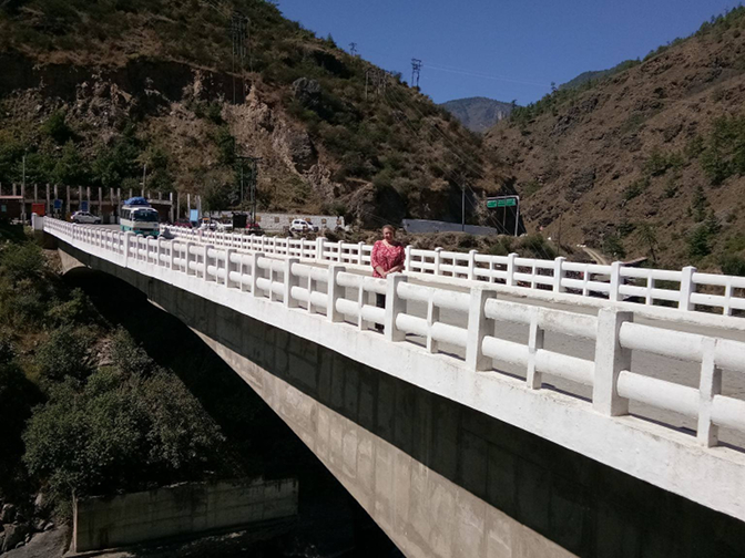 Steph on the bridge at the confluence Steph on the bridge at the confluence