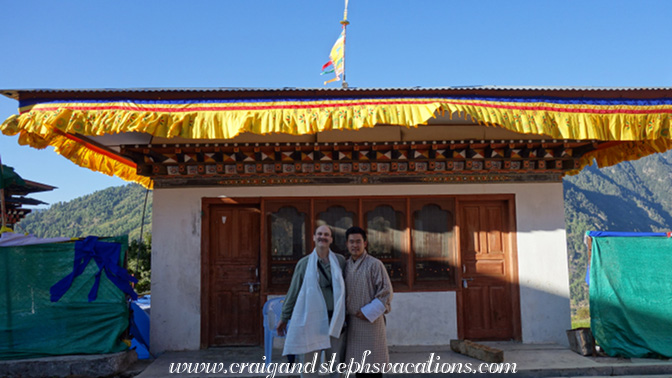 Craig and Sonam in front of the butter lamp building Craig and Sonam in front of the butter lamp building
