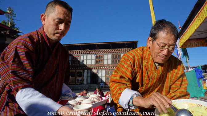 Serving butter tea and rice Serving butter tea and rice