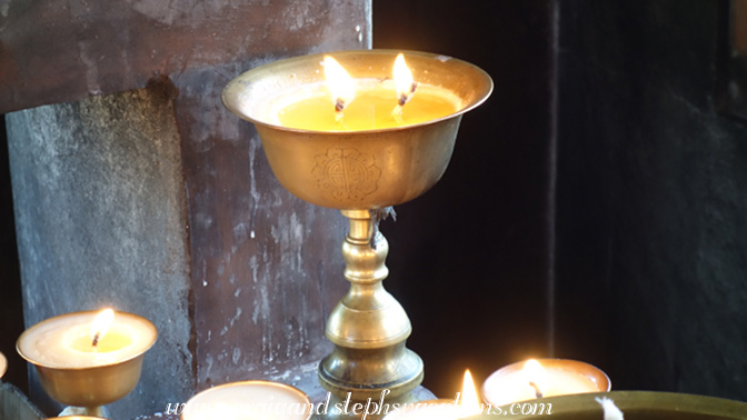 We lit this two-wicked butter lamp, which will burn for two days We lit this two-wicked butter lamp, which will burn for two days